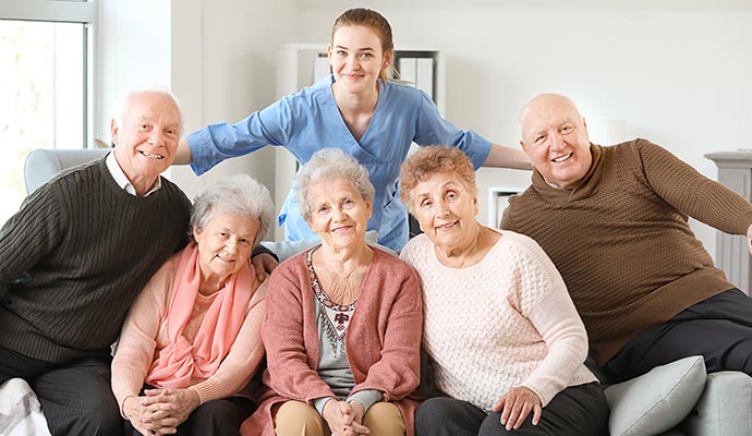 group of old age people with a care givers