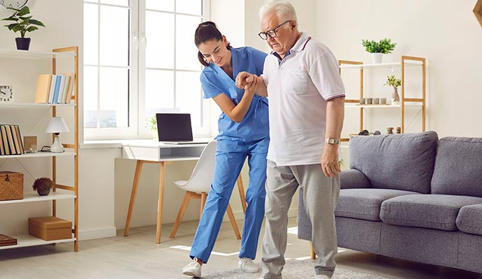 a nurse is taking care of a senior resident